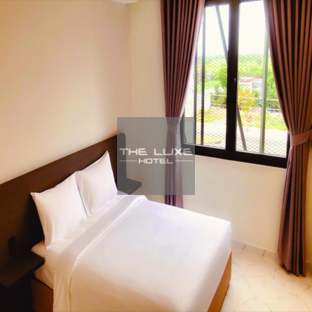 Phòng DeLuxe Có Giường Cỡ Queen - Có Cửa Sổ